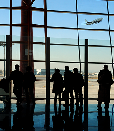Accident & Health Business Travel Accident Walking through airport terminal on business travel
