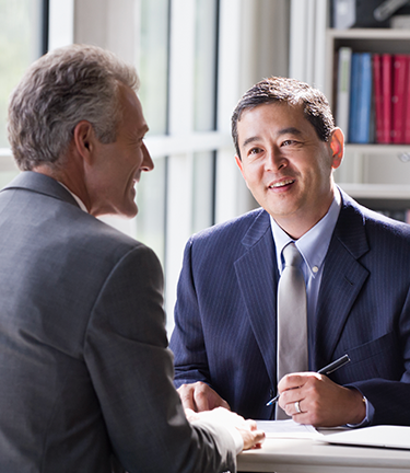 Life Insurance ADD Agent and insured discuss the terms of current life insurance and AD&D Policies